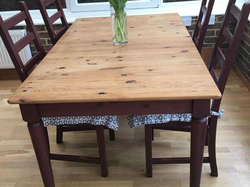 Extending pine table and four chairs