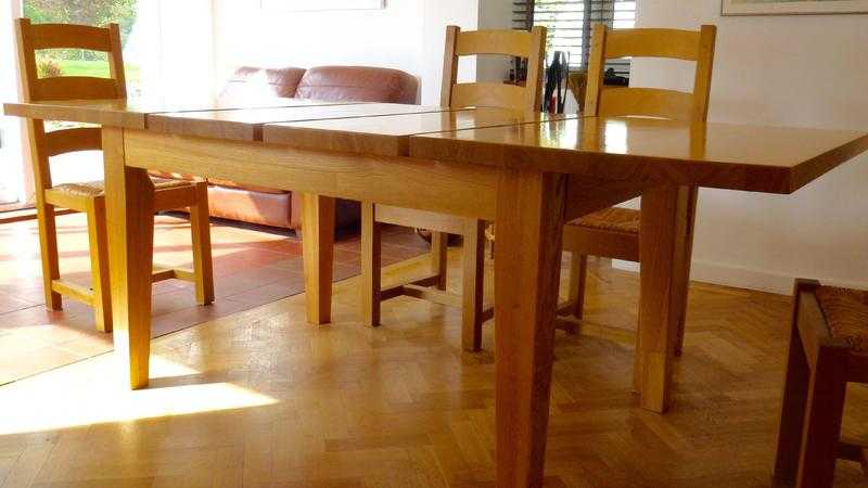 Extending solid Ash dining table.