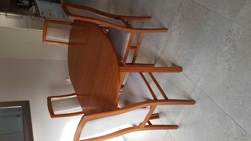 Extending Teak dining table with 4 chairs