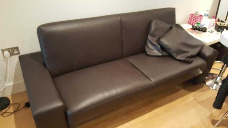 Faux-leather 2-seater sofa-bed and armchair in perfect condition