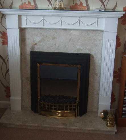 Fire surround with plinth
