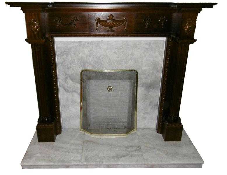 Fireplace- A classic Mahogany mantelpiece and marble hearth and inset