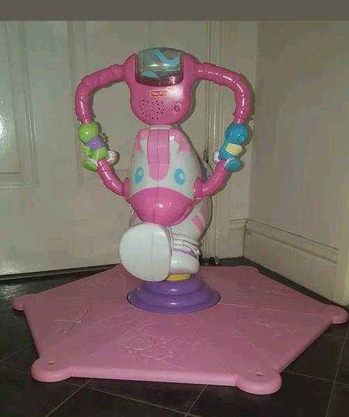 Fisher price girls pink bounce and spin zebra music l8ghts in very good condition.