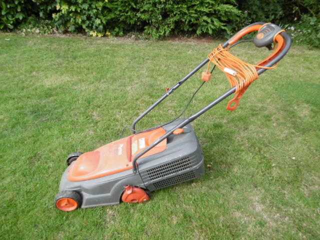 Flmo 320 VT Electric Lawnmower with instructions and Toolkit