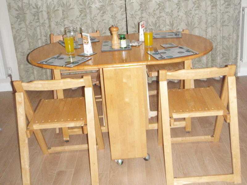 Folding Dining Table and Four Chairs - Very good quality