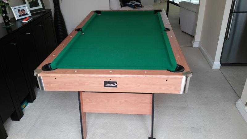 Folding pool table with accessories.