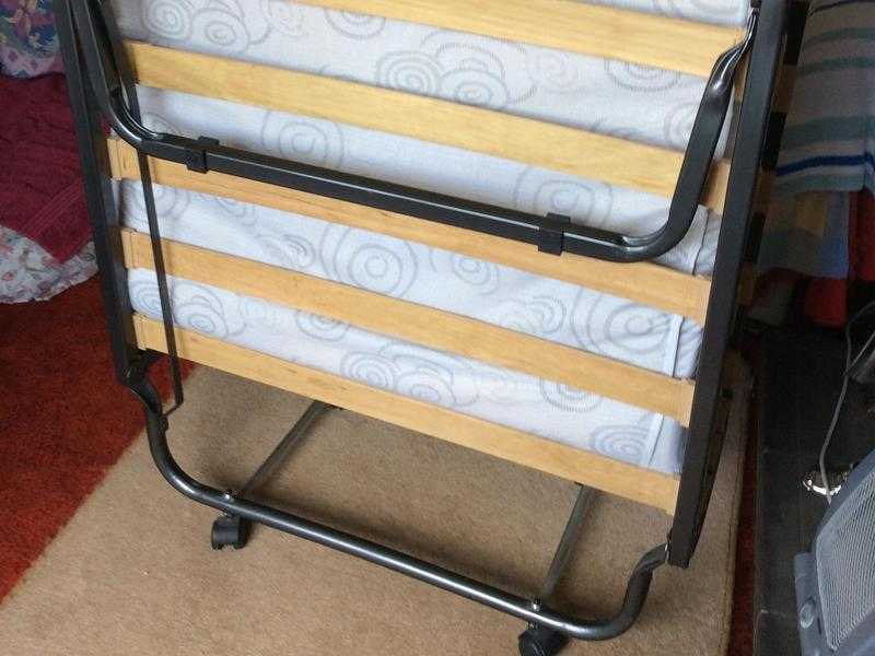 Folding put-up bed. Good clean condition 25