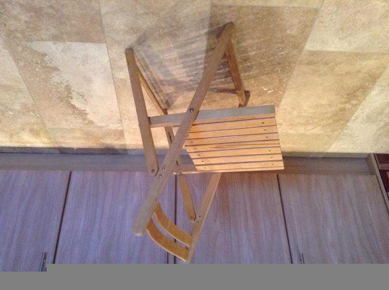 Folding wooden chairs in good condition