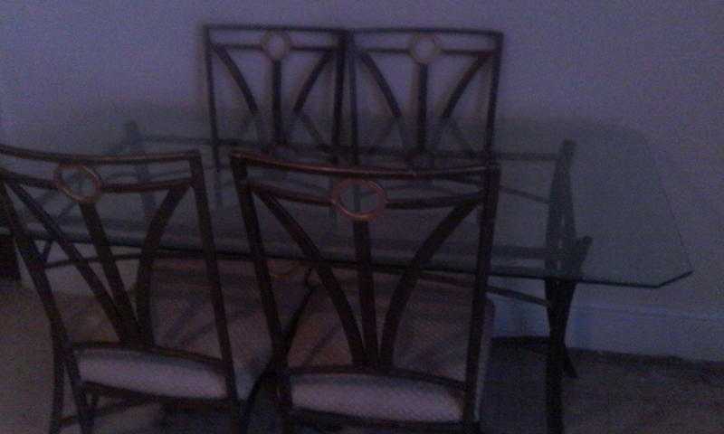 for quick sale glass table with 4 chairs good condition