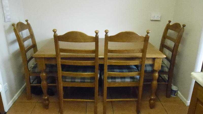 For Sale .Solid wood table and 4 chairs. 125. would need to be collected from Rumney, Cardif
