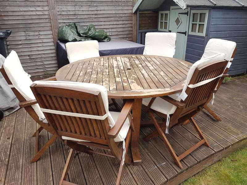 For Sale - Teak Dining Table and Chairs (with cushions, parasol and cover)