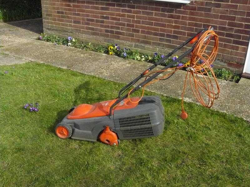 Free to Collector  Flymo electric lawnmower.  Suitable for small garden