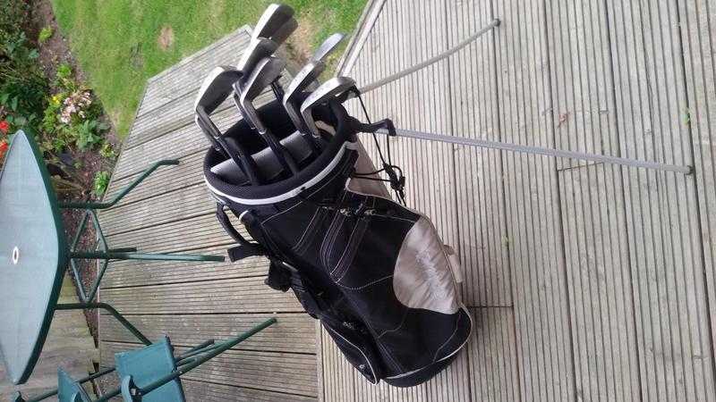 Full set of Wilson irons  golf bag with stand.