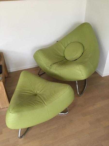 Funky, modern pistachio green leather chairs with matching footstools
