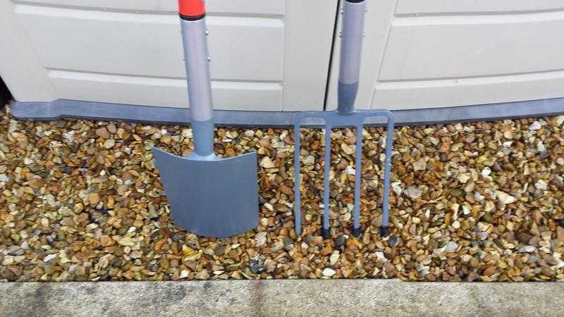 galvanised steel fork and spade