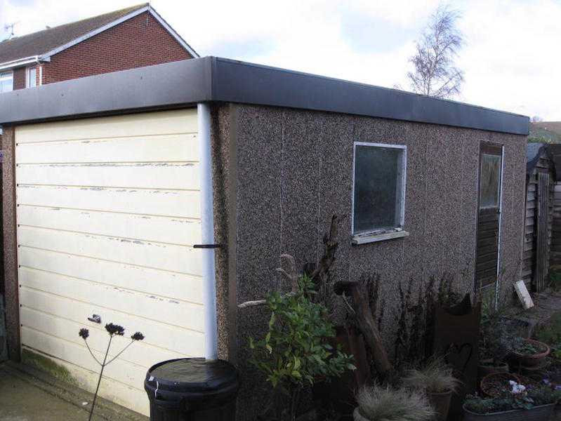 Garage metal up and over door.