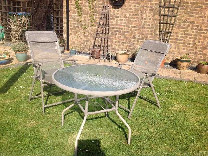 Garden table (fixed toughened glass top) two reclining chairs