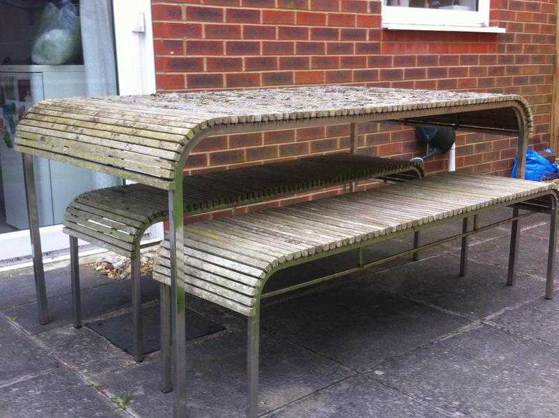 Garden table with 2 matching benches.