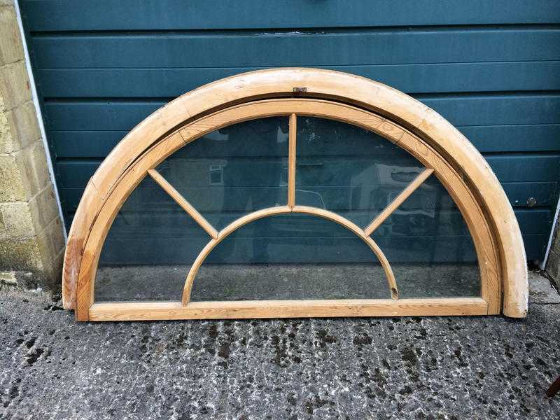 Georgian fanlight window with frame in stripped pitch pine, fully glazed.