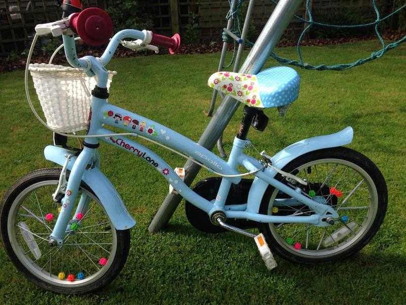 Girl039s bike. 16quot wheels. Apollo Cherry Lane blue with flowers and front basket. Childs bicyle.