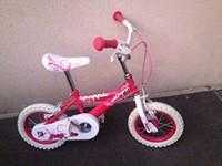 Girls Huffy, Poppie 12quot Bike with matching stabilizers - as New Condition. Paid 100 new