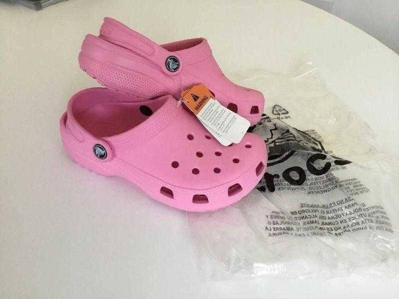 Girls or ladies pink Crocs, UK size 2 or Euro size 35.  Brand new