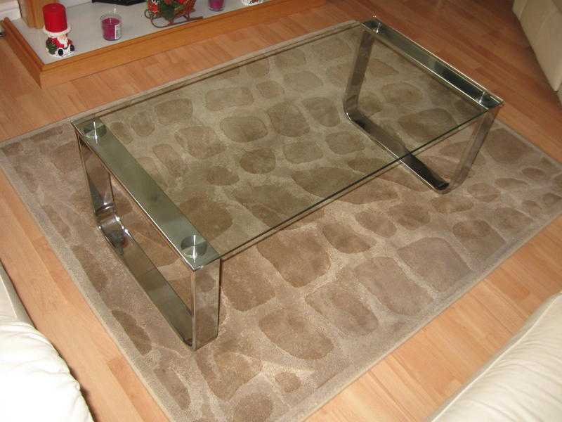 Glass and chrome coffee table and matching tall unit