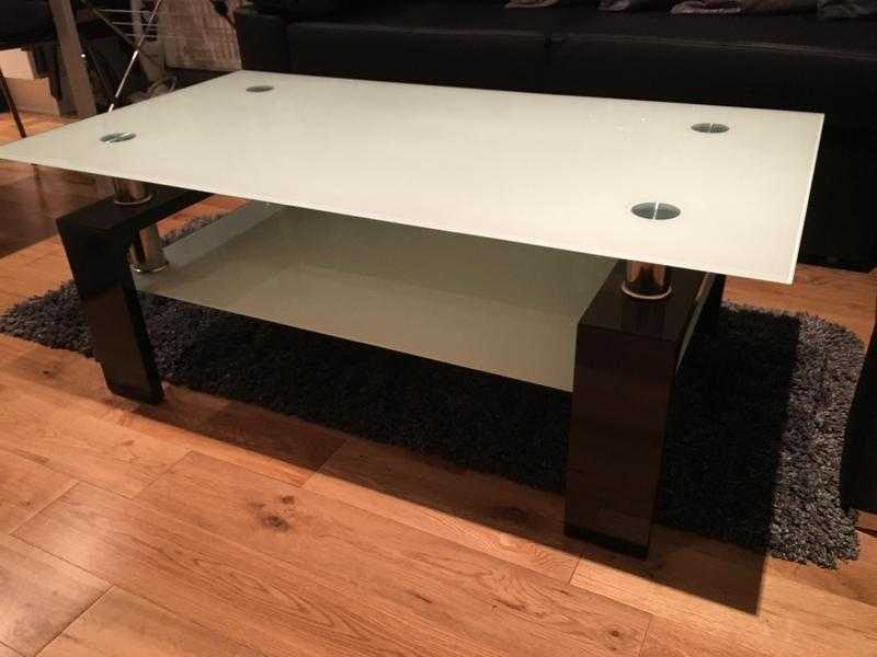 Glass Coffee table - frosted glass and gloss black legs.