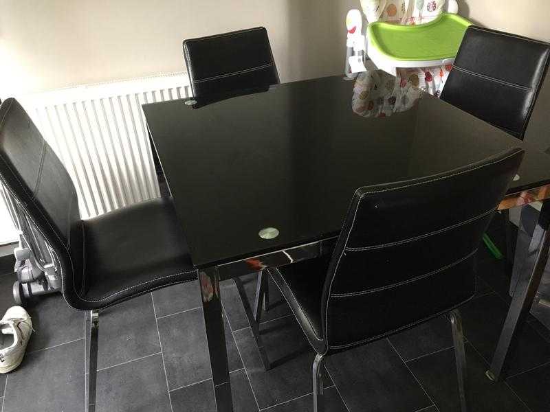 Glass dining table and 4 chairs