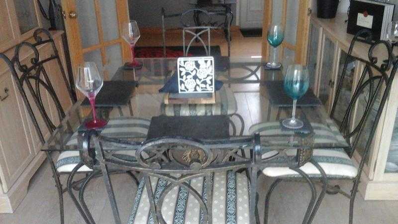 glass table and 4 chairs