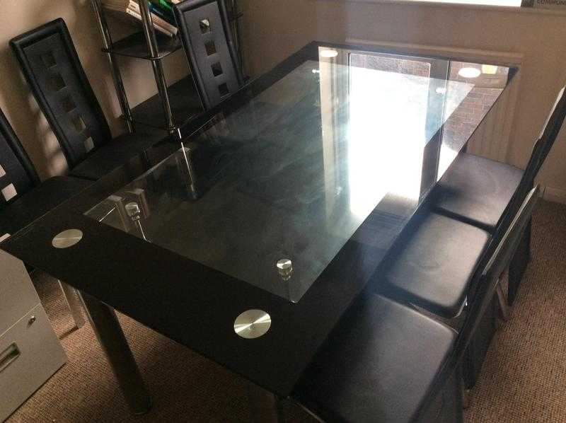 Glass table and 6 chairs