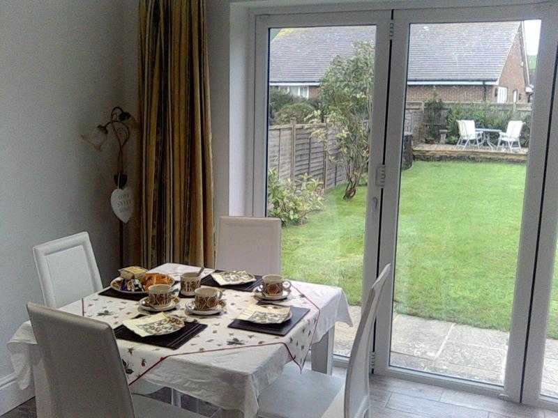 glass topped dining table  4 chairs