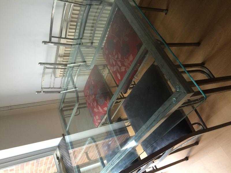 Glass topped table amp chairs