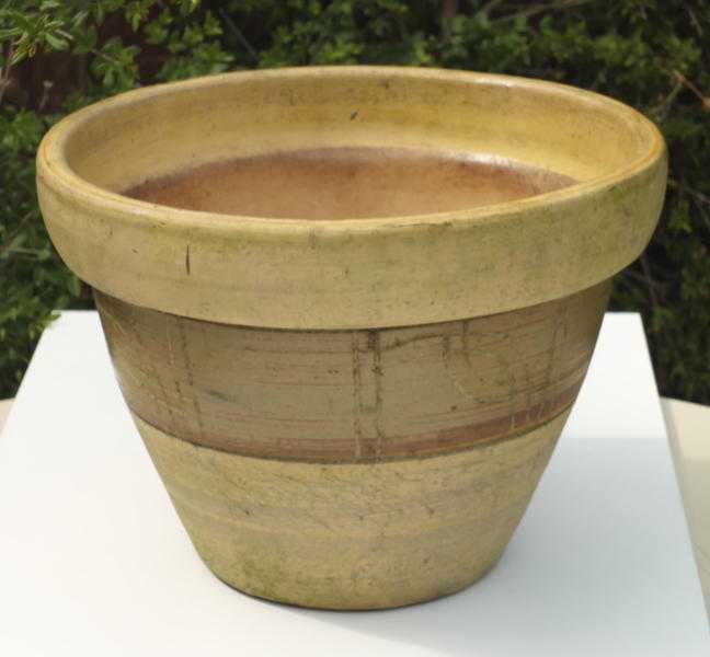 Glazed ceramic terracotta plant pot in subtle yellow for exterior use 14in