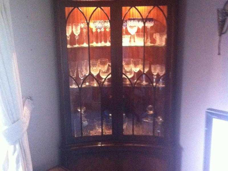 Glazed mahogany corner cabinet