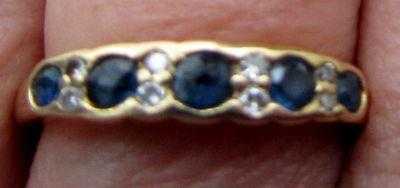 Gold (18 carat) diamond and sapphire eternity ring