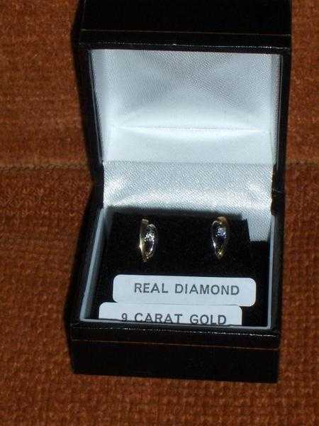 Gold and diamond stud earrings brand new