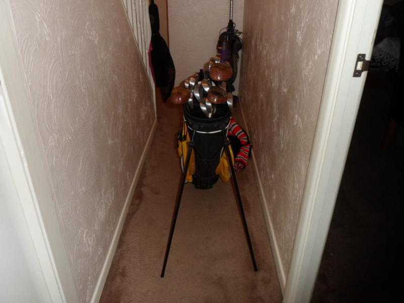 Golf clubs, bag and trolly