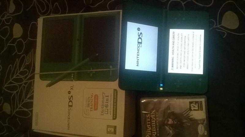 Green DSI XL Console like new in box, with two games