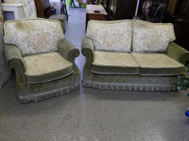 Green two seater sofa with matching Armchair