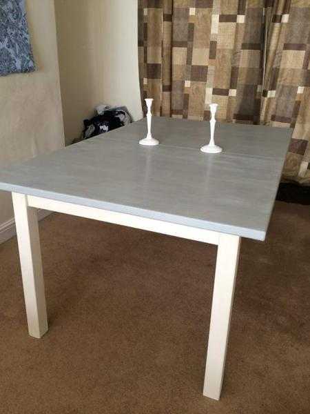 Grey  cream heavy wooden table. Extendible