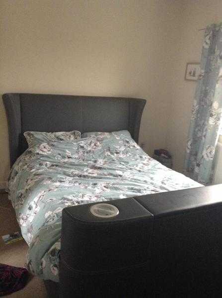 Grey kingsize TV bed with build in docking station