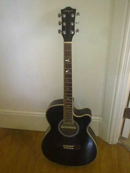 GUITAR  Cheap and Cheerfull Martin Smith acoustic. Could use some attention, however,Plays well.