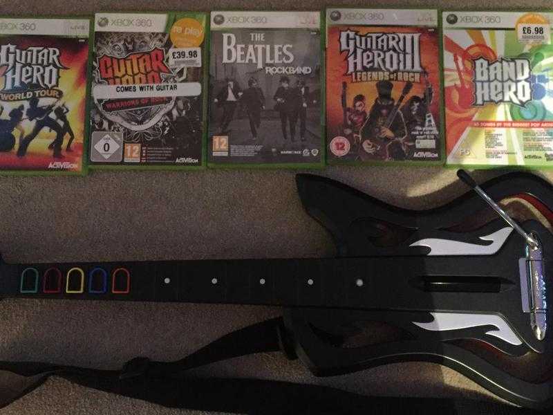 Guitar hero guitar and 5 games