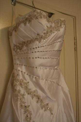 Handcrafted brand new wedding gown