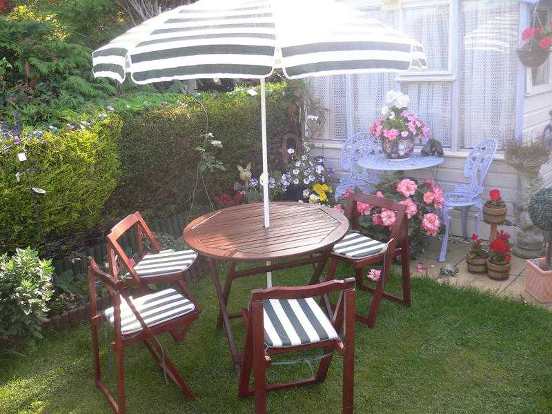 hardwood garden set with or without parasol and cushions.