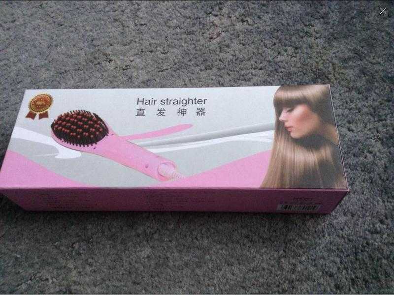 Heated hair straightening brush