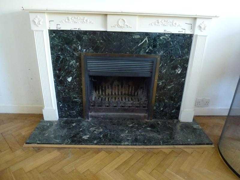 Heatstream 60 Fire, with Wood fireplace surround and Marble facia.