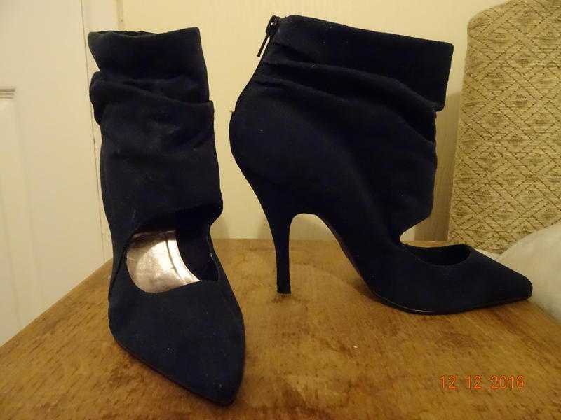 High heeled shoes