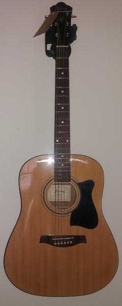 IBANEZ  quotlooks like newquot acoustic guitar 6 String, right hander. Plays and sounds well.  All good